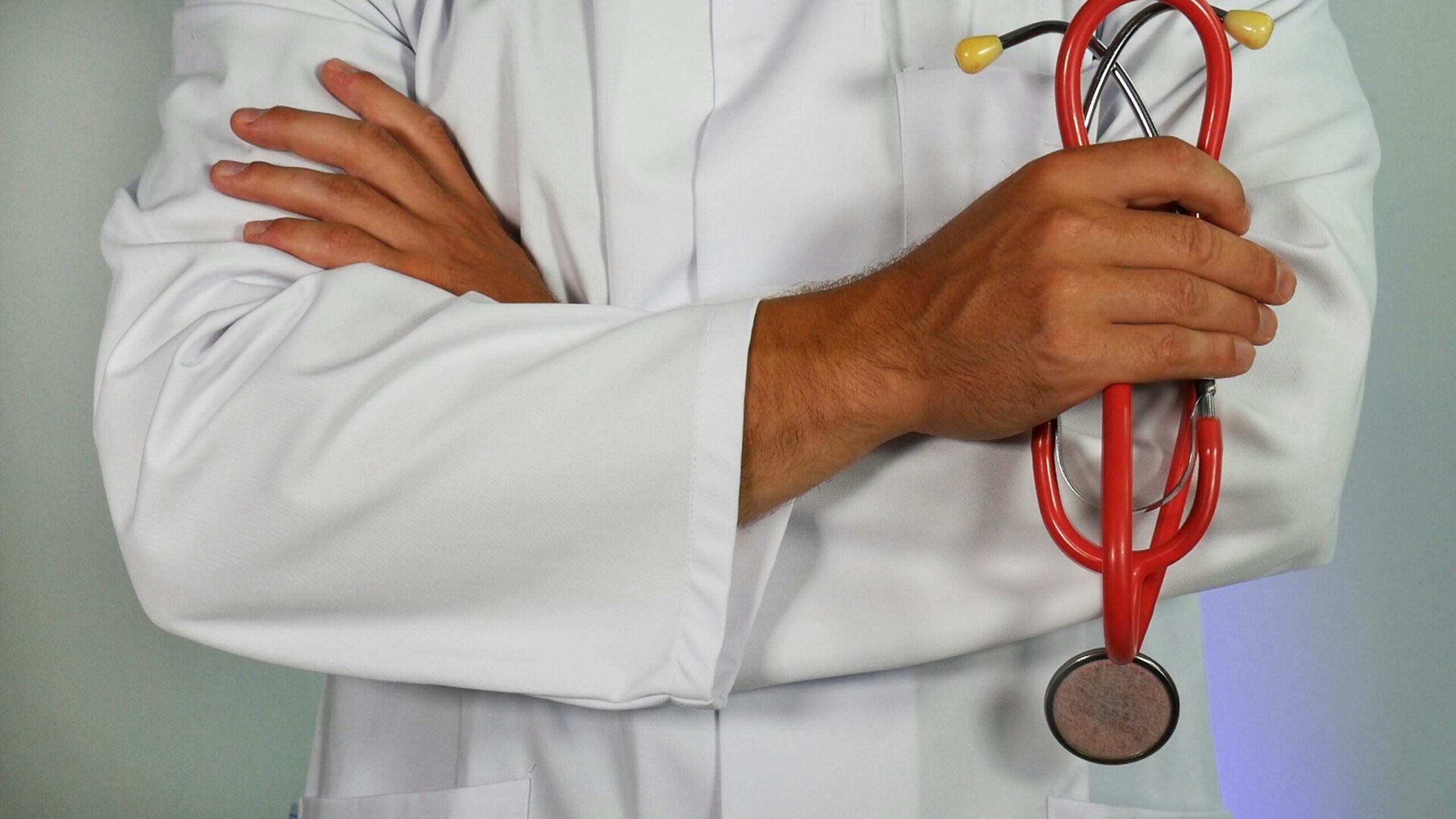 Healthcare professional holding a stethoscope
